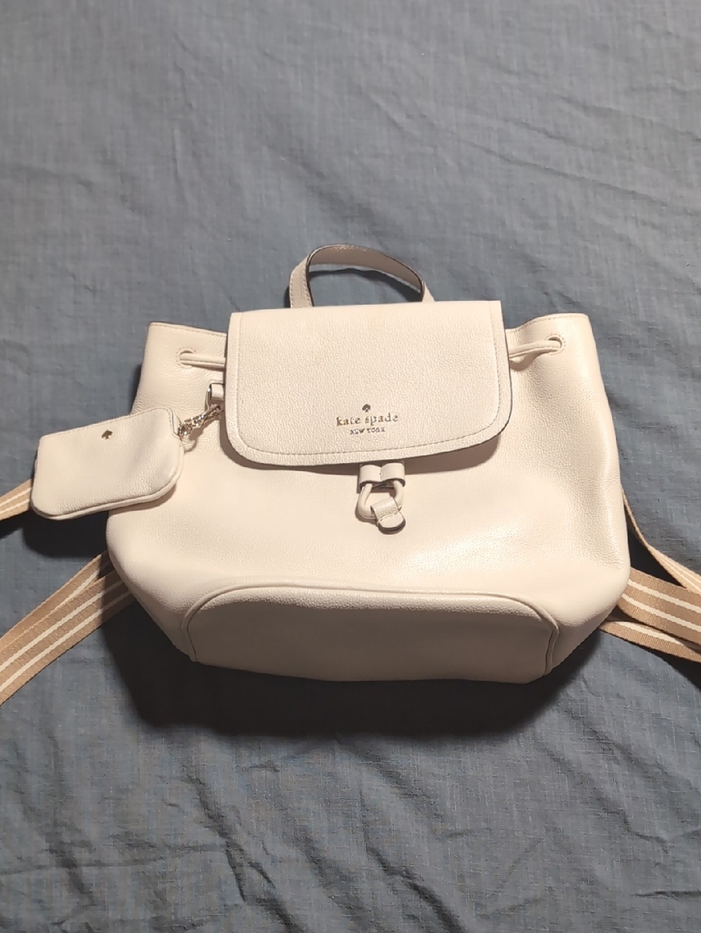 kate spade cream leather drawstring backpack with striped straps